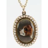 A Victorian gold and seed pearl set reverse crystal intaglio pendant  in the form of a bulldog on