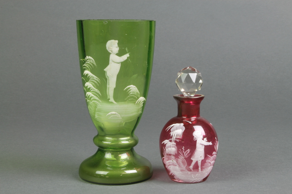 A Mary Gregory style cranberry scent, now with faceted stopper 4", a ditto green glass beaker 6"