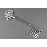 A silver plated presentation key 4"