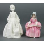 A Royal Doulton figure - Bo Peep 4 1/2" and a white glazed figure of a girl 6" Both items in this
