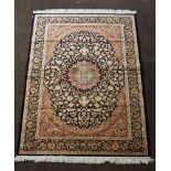 A blue and white ground Belgian cotton Persian style rug with central medallion 75" x 56"