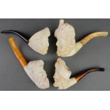 4 modern carved meerschaum pipes with mask bowls