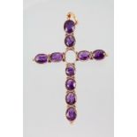 A gold amethyst set cross (lacking 1 stone) 2 1/2"