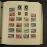 An album of stamps including Dominica, Falkland Islands,Falkland Island Dependencies, Fiji,