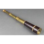 A brass and leather 3 draw telescope