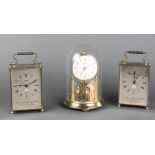 A German 400 day clock together with 2 Smiths battery operated mantel clocks to commemorate the