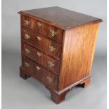 A 19th Century mahogany chest of 4 long graduated drawers with brass swan neck drop handles,