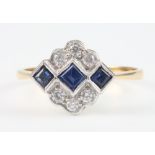 An 18ct yellow gold sapphire and diamond Art Deco style ring comprising 3 square cut sapphires and 6