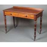 A Victorian rectangular mahogany side table with raised back, fitted 2 frieze drawers with tore