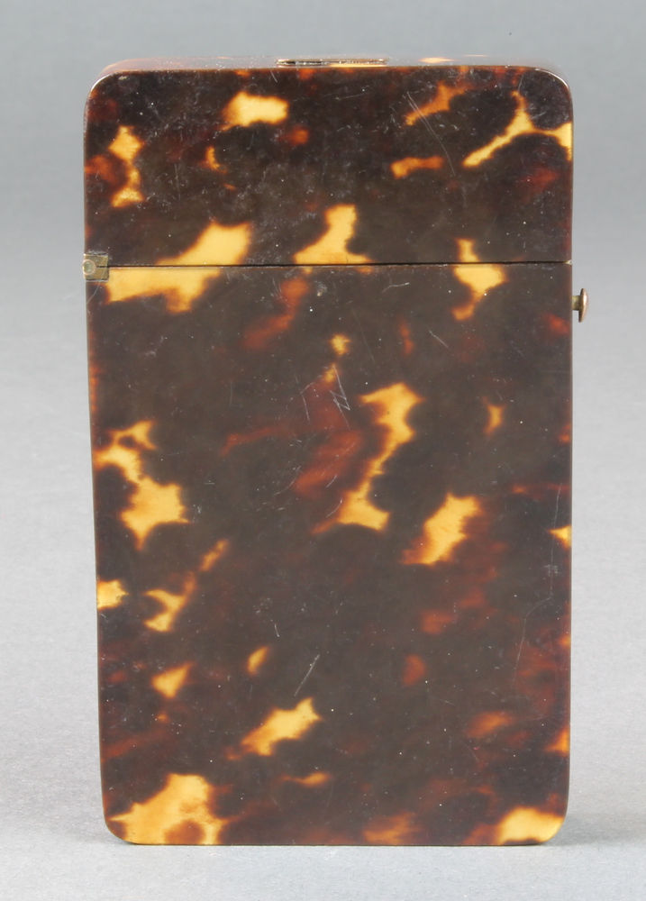A Victorian tortoiseshell card case of plain form There is a small fragment missing to the lid