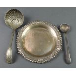 A silver nut dish with fluted and scroll rim, Birmingham 1968, 40 grams, 2 plated spoons