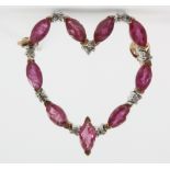 A 9ct gold gem set heart brooch