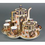 A 19th Century Davenport Imari pattern cabinet set comprising scalloped tray, teapot, lidded sugar