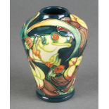 A late 20th Century Moorcroft oviform vase, the green ground decorated with frogs and lizards