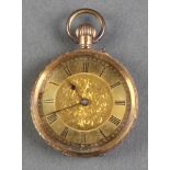 A lady's Edwardian 14ct gold watch with champagne dial The back case is broken