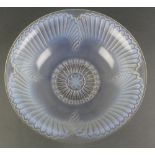 Lalique, an opalescent flared rim fruit bowl with stylised scroll decoration, with moulded capital