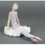 A Lladro figure of a seated ballerina 1356 10"