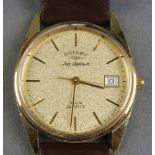 A gentleman's gilt cased Rotary Sea Captain calendar quartz wristwatch on a leather bracelet
