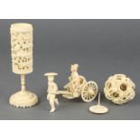 A Chinese carved ivory concentric ball decorated with flowers 1 3/4", a similar circular stand and a