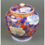 A Japanese baluster Imari vase and lid decorated with peony 5"