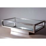 A CHROME AND GILT TWO TIER COFFEE TABLE,