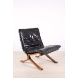 A BENTWOOD AND LEATHER UPHOLSTERED LIBRA