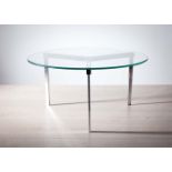 A CHROME LOW TABLE, with circular glass