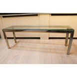 A CHROME AND GILT RECTANGULAR LOW TABLE,