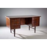 A ROSEWOOD DESK, DANISH, the rectangular