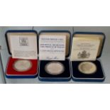 3 Leather cased sterling silver proof coins with COA