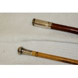 2 military Swagger sticks, 1 with silver end