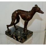 Bronze sculptured figure of a whippet on marble base, 15cm tall