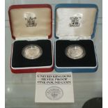 2 Leather cased sterling silver proof one pound coins, 1 with COA