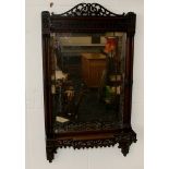Mahogany Mirror Circa 1830 with pierced Fretwork decoration and turned side columns with a pierce