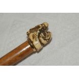 19th century Japanese parasol with gold plated collar and ivory carved figure to top