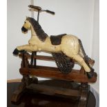 Victorian style rocking horse on wooden Frame