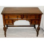 1920's Oak leather topped writing desk with brass fittings