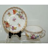 Hand painted floral cup and saucer with clear Dresden marks to base