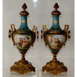 Pair of Sevres Turquoise porcelain & gilt metal mounted vases, hand painted floral portait panels
