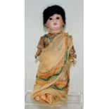 19th century German porcelain doll with moving eyes and ivory teeth, 25cm tall