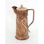 Arts and Crafts / Art Nouveau : A  large Art Nouveau copper serving jug probably for ale or wine,