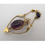 A 9ct gold Art Nouveau pendant set with amethysts and seed pearls. Approx 1 3/4" long  CONDITION: