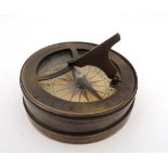 Science and Technology : a  brass Navigational tool ( being a sundial and compass) with folding