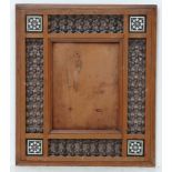 An Ottoman lattice work hardwood frame with ebony, bone and abalone inlay, image size 10 1/4 x 7 1/