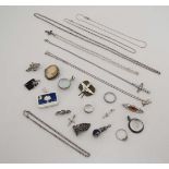 A quantity of assorted jewellery to include some silver brooches, pendants, chains etc CONDITION: