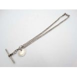 A silver curblink Albert pocket watch chain with T bar and 1840 coin fob.  CONDITION: Please Note -