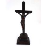 A late 18thC carved fruit wood Corpus Christi. The richly patinated Christ figure mounted on a cross