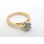 A 18ct gold ring set with diamond solitaire CONDITION: Please Note -  we do not make reference to