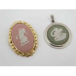 Wedgwood Jewellery : A gilt metal brooch set with pink Wedgwood Jasperware plaque to centre together