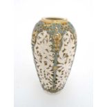 A late 19thC ornately pierced porcelain reticulated vase, probably Grainger Worcester, having arched